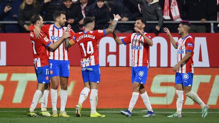 Girona menempel ketat Real Madrid di papan atas klasemen Liga Spanyol (Foto: AFP/PAU BARRENA)