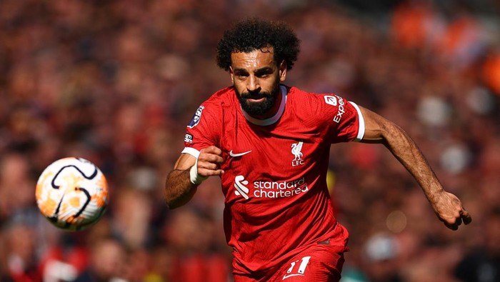 Mohamed Salah akan absen membela Liverpool selama beberapa pekan karena harus tampil di Piala Afrika (Foto: REUTERS/MOLLY DARLINGTON)